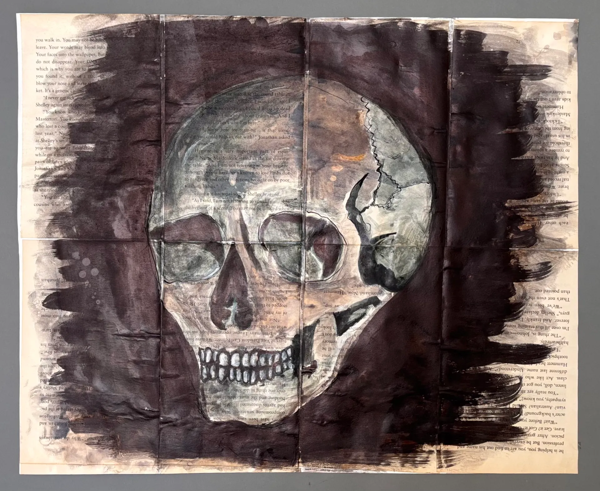 Ink Skull on Book Pages